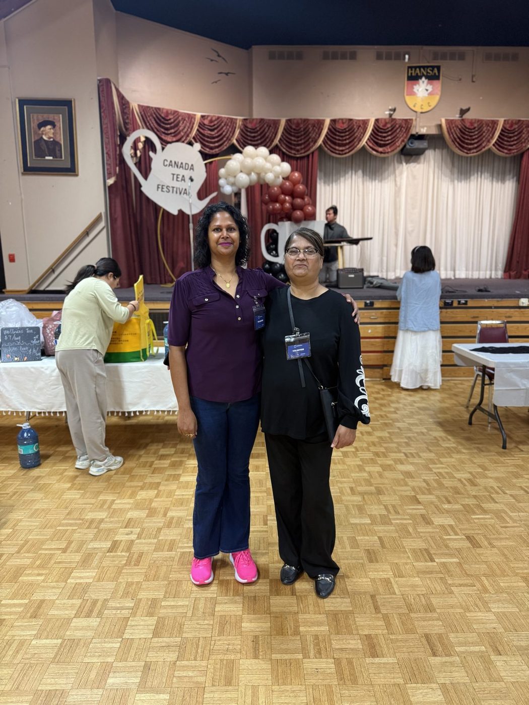 MiVolunteer volunteers staffing a community event