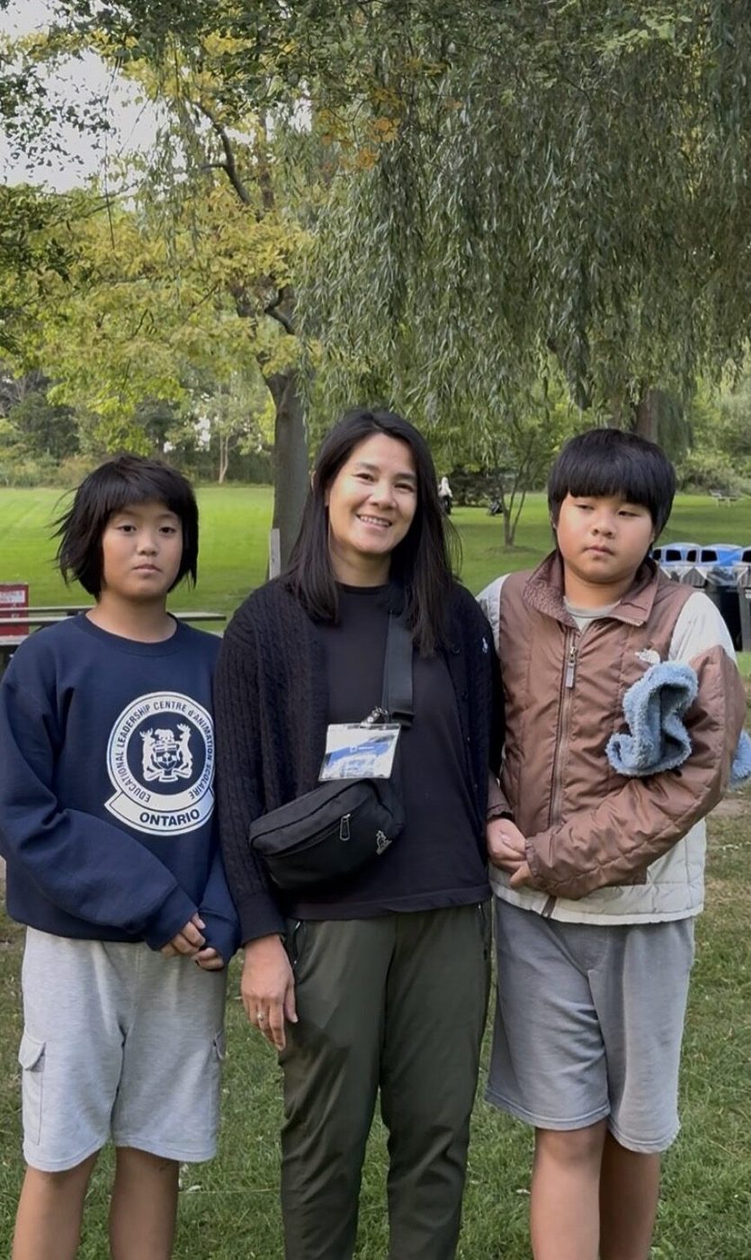 Student volunteers earning community involvement hours at a park cleanup